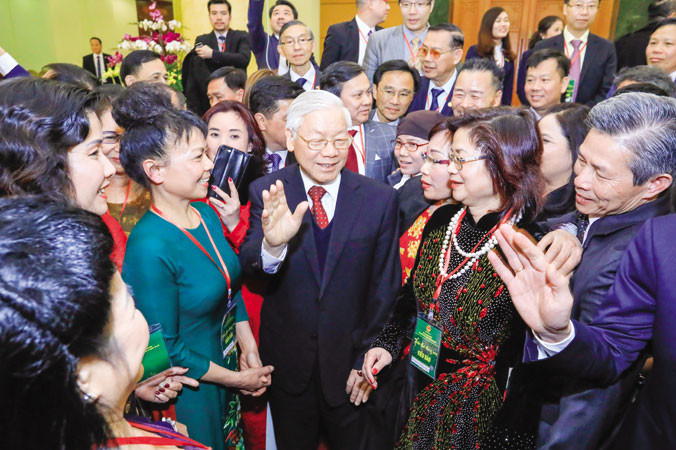 Tổng Bí thư Nguyễn Phú Trọng gặp gỡ và nói chuyện với kiều bào ở nước ngoài về Việt Nam ăn Tết Xuân Mậu Tuất (7/2/2018). Ảnh: Như Ý.