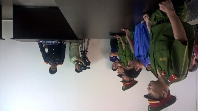 Nguyễn Văn Tú (áo xanh) tại phiên tòa ngày 19/12. Ảnh: Tân Châu