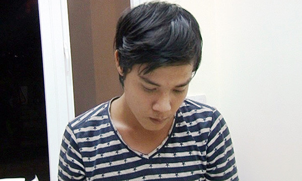 Nguyễn Quốc Khánh tại cơ quan công an.