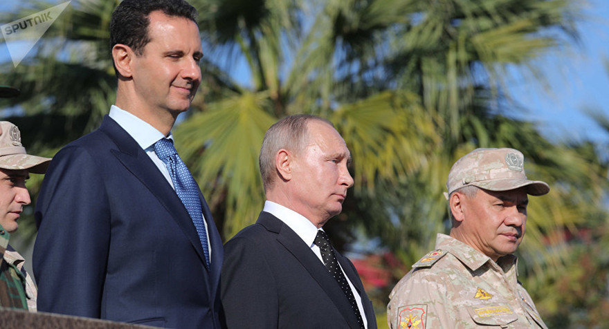 Tổng thống Nga Putin gặp người đồng cấp Syria Bashar al-Assad tại căn cứ không quân Khmeimim. Ảnh: Sputnik