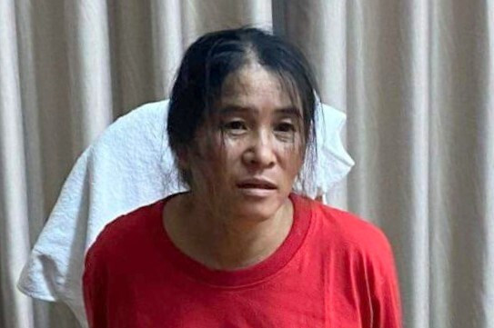 Lê Thị Chanh khi bị bắt ở TP HCM giữa đêm 12/12. Ảnh: Công an Bình Thuận