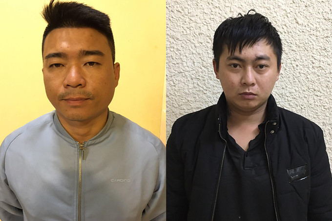 Giang (trái) và Toại tại cơ quan điều tra