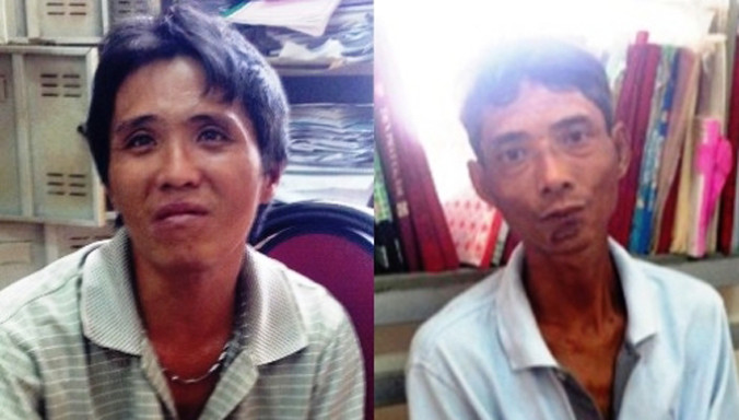 Ba (trái) và Dũng tại cơ quan điều tra. Ảnh: Hải Hiếu.