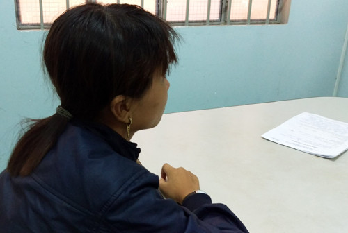 Phụng làm việc với cảnh sát. Ảnh: Xuân Ngọc