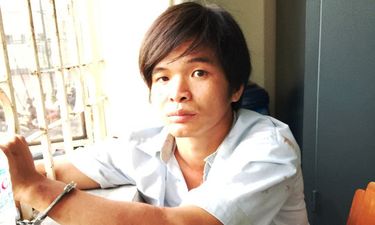 Trần Chí Công tại trụ sở công an. Ảnh: Người Lao Động