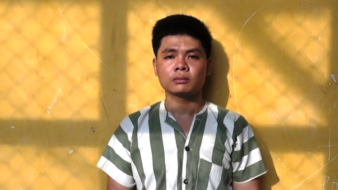 Nghi can Quốc tại cơ quan điều tra. Ảnh CA cung cấp.