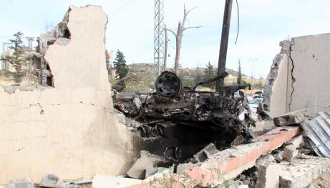 Hiện trường một vụ đánh bom xảy ra ở Libya ngày 24/11. Ảnh: THX/TTXVN.