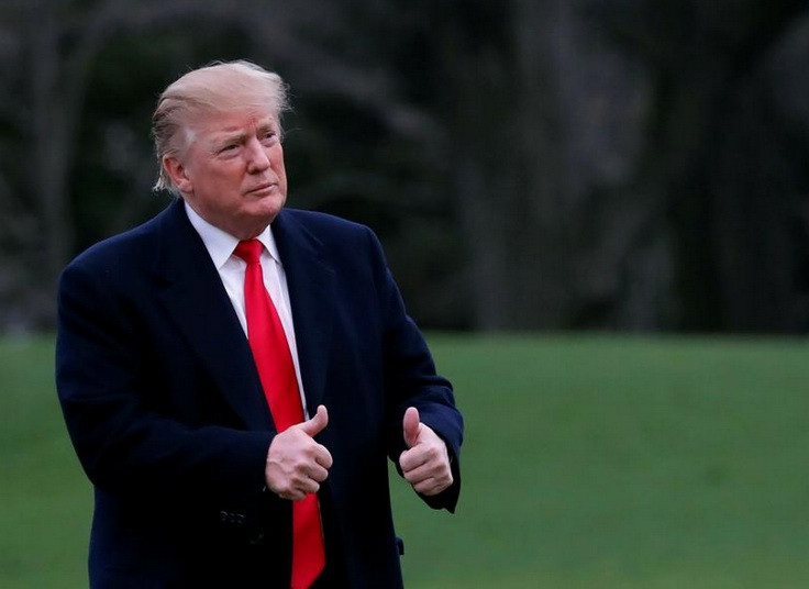 Phản ứng của ông Trump khi nghe kết luận của cuộc điều tra. (Ảnh: Carlos Barria)