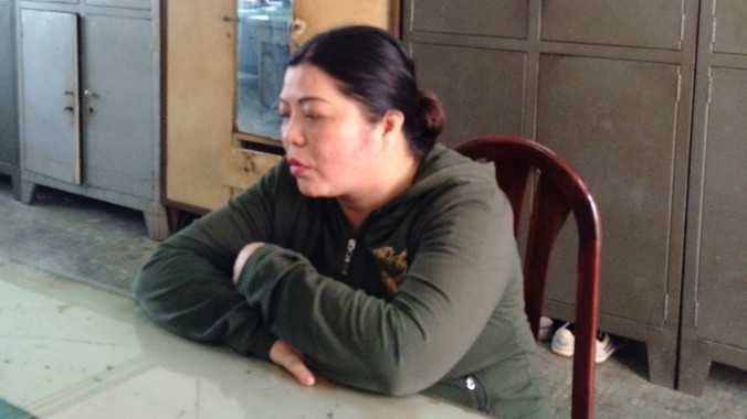 Má mì Đinh Thị Thanh tại cơ quan công an. Ảnh CA cung cấp.