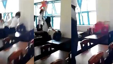 Nữ sinh lớp 7/5 bị đánh hội đồng. Ảnh cắt ra từ clip.