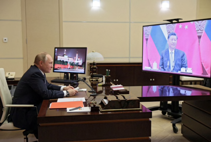 Tổng thống Nga Vladimir Putin trong cuộc gặp trực tuyến Chủ tịch Trung Quốc Tập Cận Bình. (Ảnh: Sputnik)