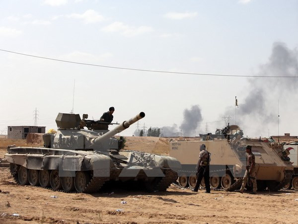 Binh sỹ Iraq trong chiến dịch giành lại quyền kiểm soát nhà máy lọc dầu Baiji. (Nguồn: AFP/TTXVN)