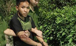 Đối tượng Phạm Doãn Quân tại hiện trường vụ án 