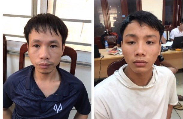 Vũ Trung Trực (áo tối màu) và Trần Đắc Chương (áo trắng) đang bị tạm giữ để điều tra, xử lý.