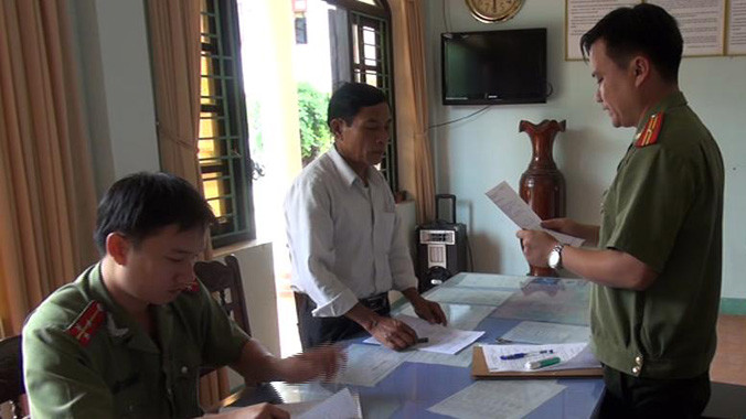 Ông Nguyễn Xuân Hiệp tại cơ quan công an. Ảnh: Công an cung cấp.