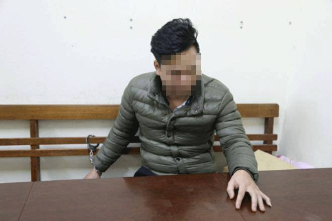 Đối tượng K. tại cơ quan công an. Ảnh: Nguyễn Thái