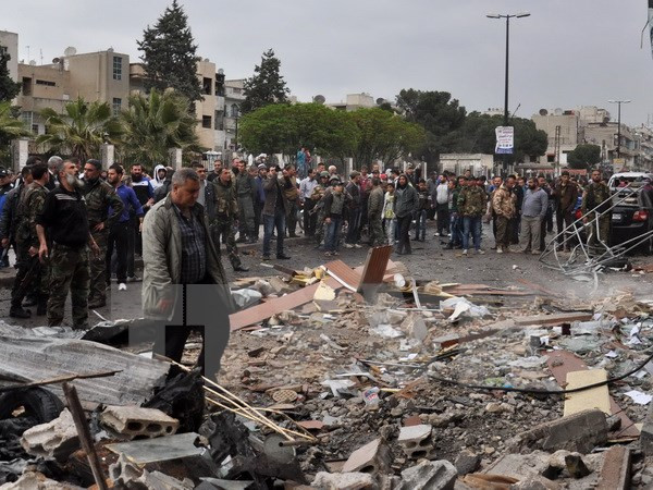 Hiện trường vụ nổ bom tại Homs, Syria. (Nguồn: AFP/TTXVN)