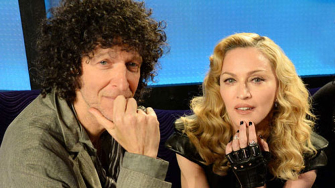 Madonna và người dẫn chương trình Howard Stern. Ảnh: Reuters.