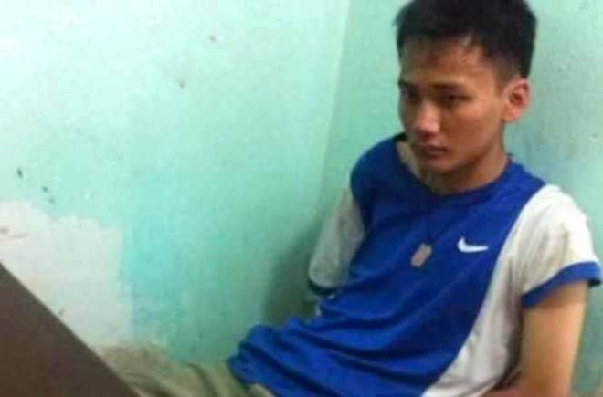 Lê Thanh Tuấn tại cơ quan công an. Ảnh: HP