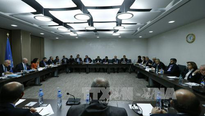 Vòng đàm phán ở Geneva (Thụy Sĩ). Ảnh: AFP/TTXVN.