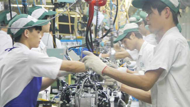 Sản xuất của một doanh nghiệp có vốn đầu tư nước ngoài -Ảnh minh họa: Hùng Lê