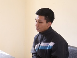 Khang tại cơ quan điều tra.