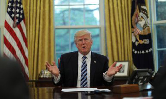 Tổng thống Mỹ Donald Trump trong một cuộc trả lời báo chí tại Nhà Trắng. Ảnh: Carlos Barria.