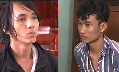 Hùng và Vinh tại cơ quan công an. Ảnh: Cửu Long.