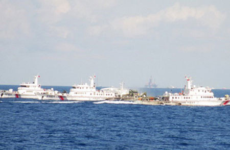 Bản tin 8H: Trung Quốc tăng máy bay, quần thảo khu vực giàn khoan phi pháp