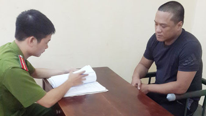 Đối tượng Chu Xuân Hiểu tại cơ quan điều tra.