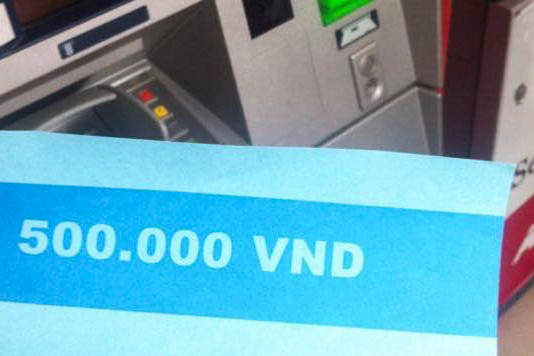Hình ảnh tờ giấy in chữ 500 nghìn đồng.