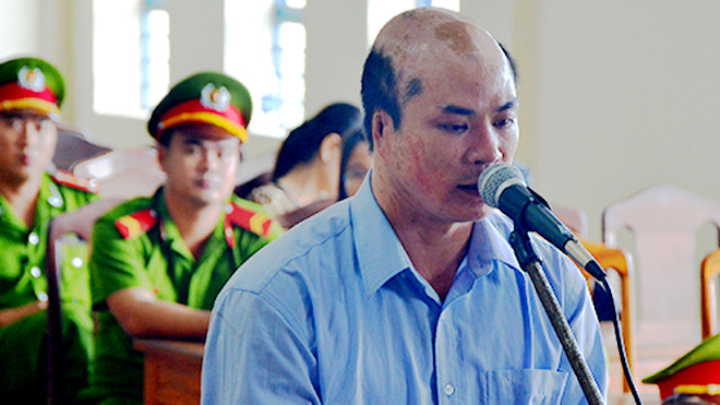 Vĩnh chối tội tại phiên xử. Ảnh: Ngọc Trường