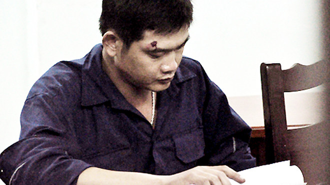 Tú tại cơ quan điều tra. Ảnh: Quốc Thắng