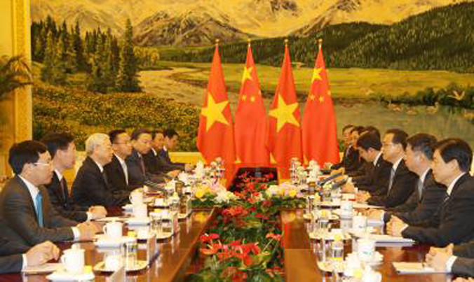 Tổng Bí thư Nguyễn Phú Trọng hội kiến với Ủy viên Thường vụ Bộ Chính trị, Thủ tướng Quốc vụ viện Trung Quốc Lý Khắc Cường. (Ảnh: Trí Dũng/TTXVN)