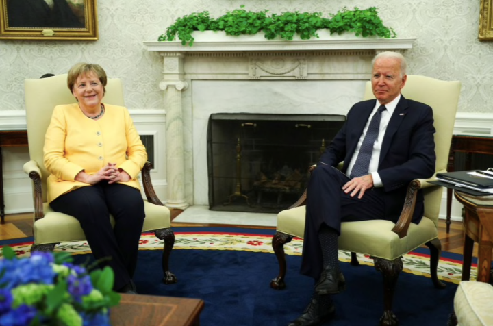 Thủ tướng Đức Angela Merkel và Tổng thống Mỹ Joe Biden. (Ảnh: Reuters)