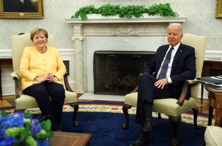 Thủ tướng Đức Angela Merkel và Tổng thống Mỹ Joe Biden. (Ảnh: Reuters)