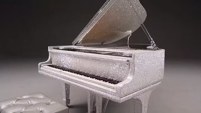 Cây đàn piano nạm kim cương xa xỉ này có giá bán 627.000 USD (tương đương hơn 14 tỷ đồng) và được đặt hàng bởi tỷ phú Sheikh ở Qatar.