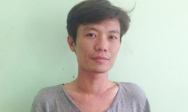 Đối tượng Phạm Hùng Tấn tại cơ quan công an - Ảnh: Tuấn Thành