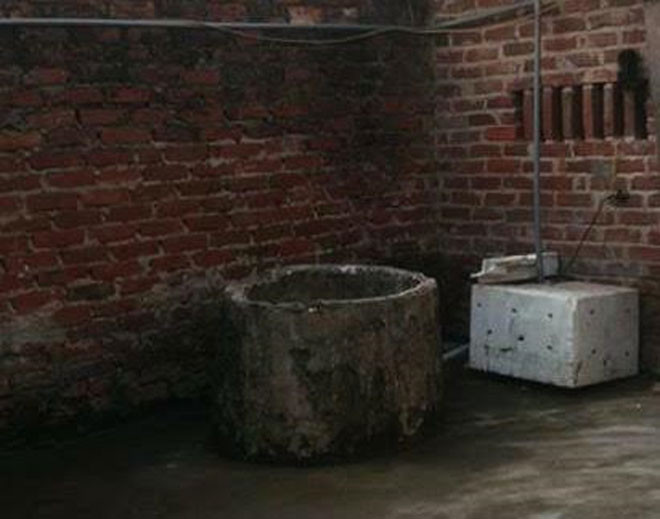 Giếng nước nơi phát hiện thi thể bà G.