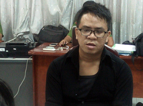 Tuấn tại cơ quan điều tra, Ảnh: Quốc Thắng