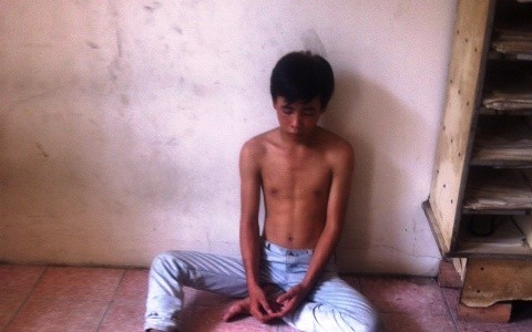 Trần Quang Tú tại cơ quan công an