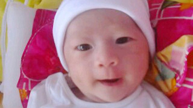 Bé Huy tăng cân thêm 900 gr so với ngày mới xuất viện cách nay 2 tuần.