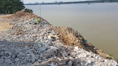 Đề xuất xây tường rào ở 'điểm nóng' đổ phế thải đê Bạch Đằng