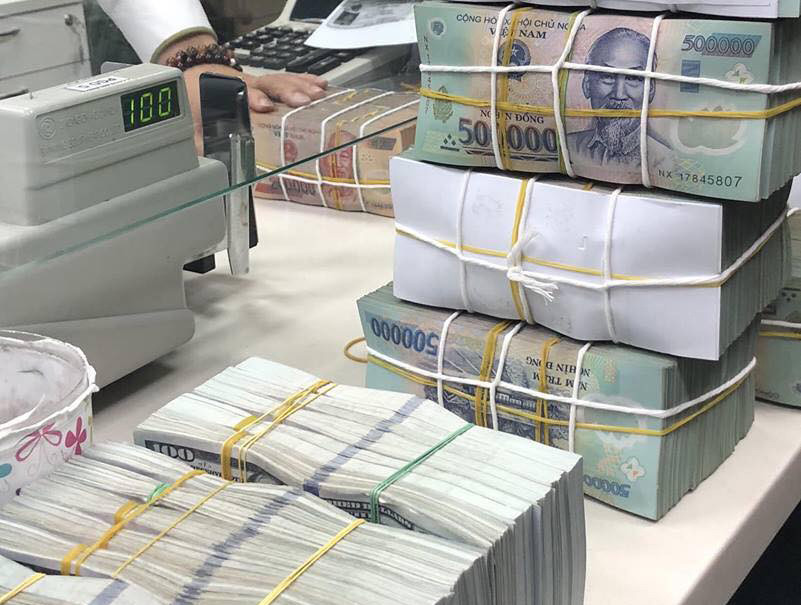 tiền gửi vào 13 ngân hàng có dấu hiệu chững lại 