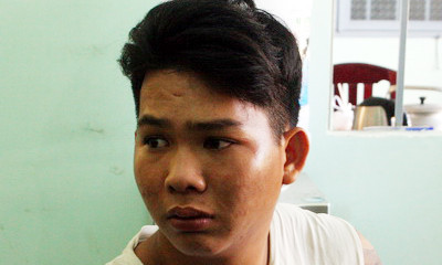 Trần Hoàng Anh bị bắt sau 2 giờ gây án. Ảnh: Hoàng Trường