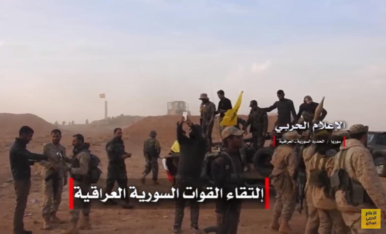 Quân đội Syria, Iraq, cùng đồng minh ăn mừng chiến thắng. Ảnh cắt từ video