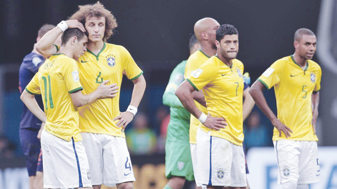 Brasil kết thúc trong thất vọng, Scolari vẫn chưa từ chức. Ảnh: AP/Getty Images