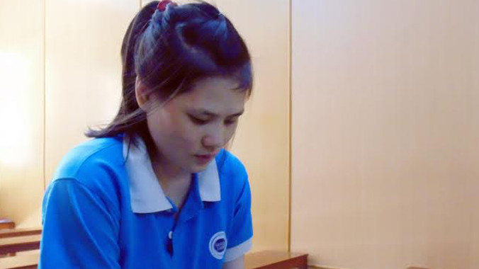 Lê Thị Liên tại phiên tòa ngày 14/4. Ảnh: Tân Châu.