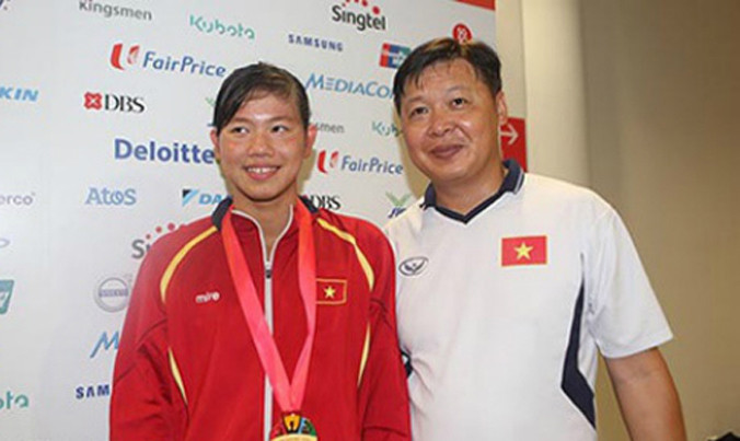 HLV Đặng Anh Tuấn và kình ngư Nguyễn Thị Ánh Viên. Ảnh: Lâm Đồng.