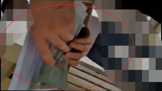 Hà Nội: Đình chỉ một cán bộ vụ 'mất tiền cho cò để được tiêm vắc xin COVID-19 thần tốc'